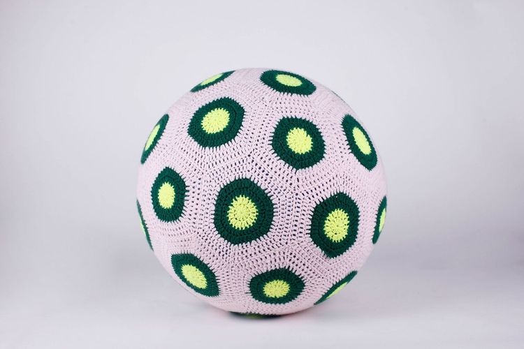 Crocheted Acrylic Yarn Covering A Yoga Ball